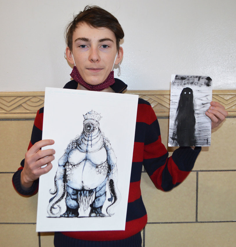 Edward Lundquist, from Livingston Manor, is the first Sullivan County student to receive the American Vision award for his work "Sky Tree." He is shown here with two works from the 2022 Scholastic Art Awards.